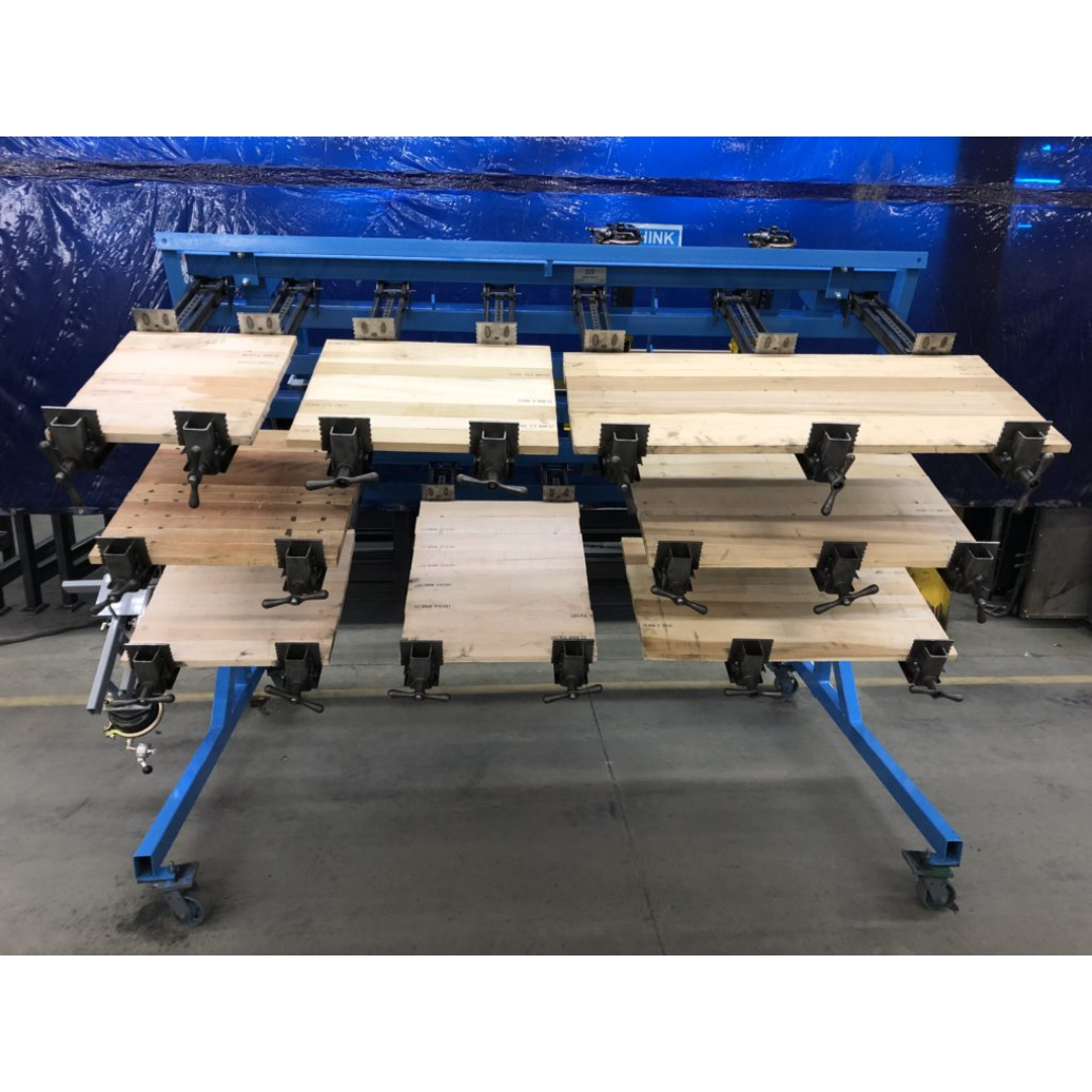 JLT #718A-8 8′ Buddy System multi-level clamp setup for simultaneous panel glue-ups