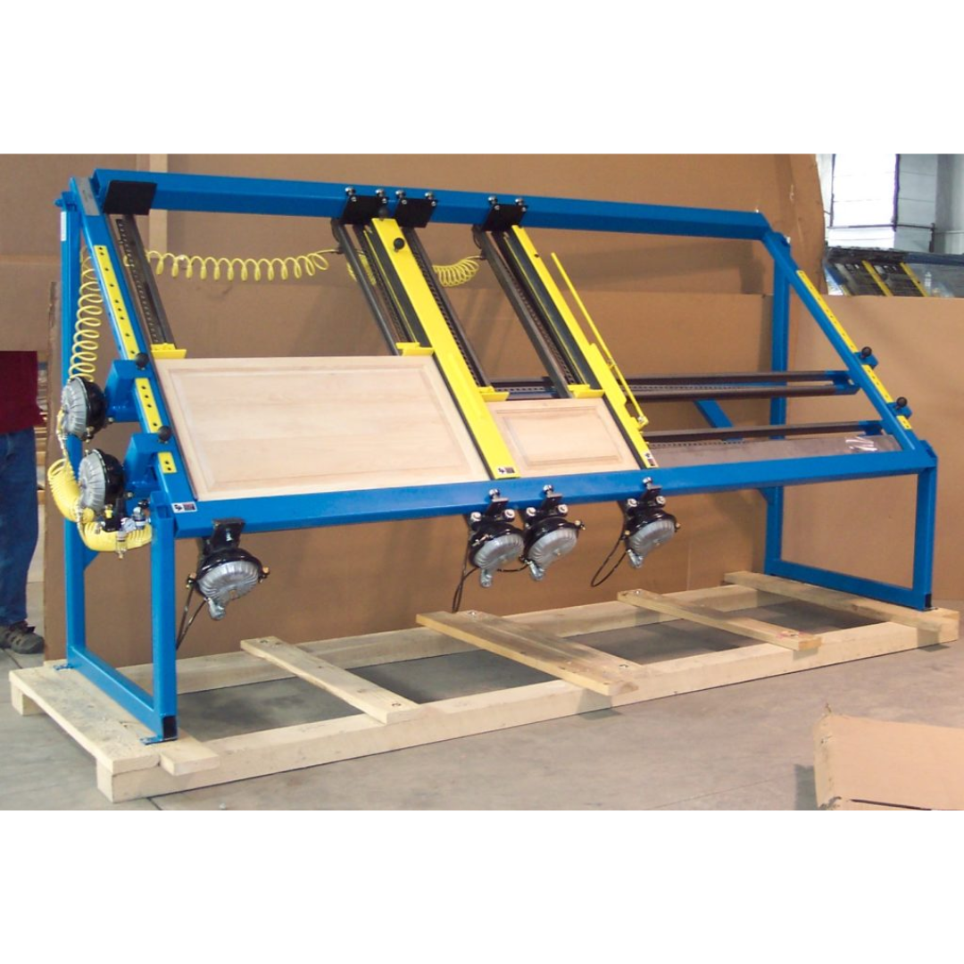 JLT #79K-10 Heavy Duty Entry Door Clamp in operation with operator loading full-size entry door for precision clamping