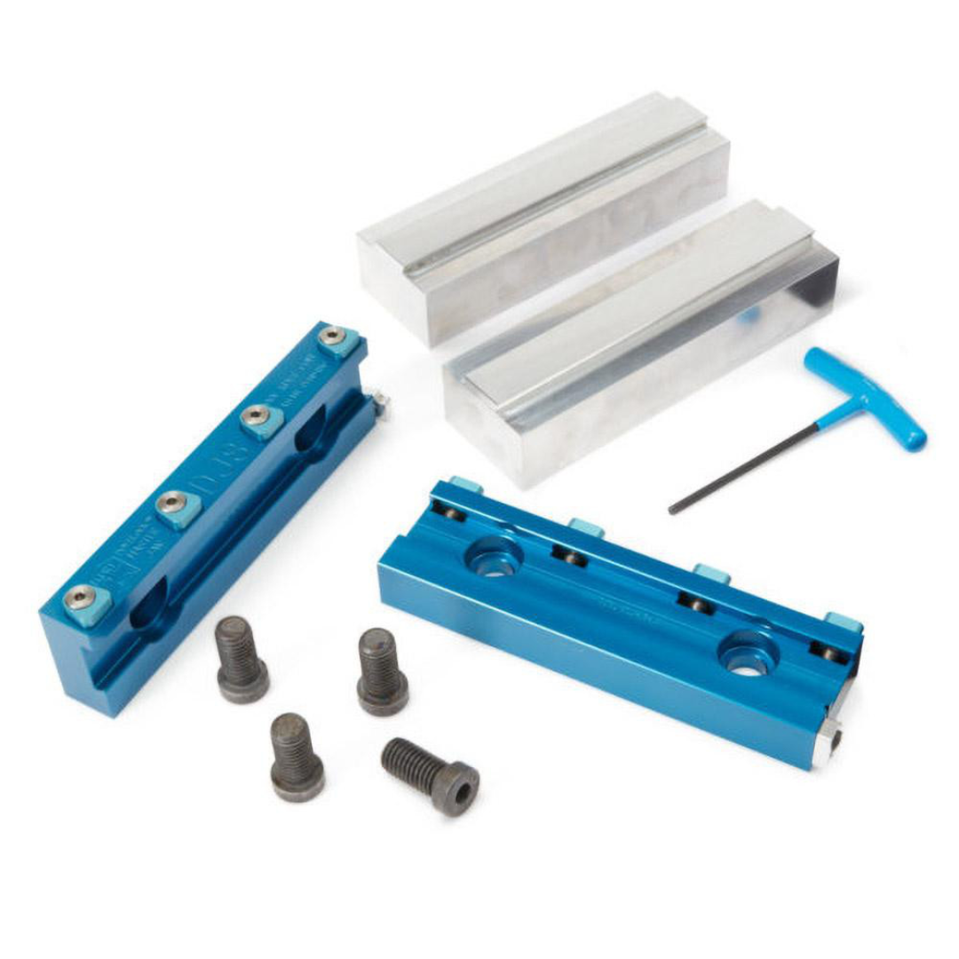 Kurt 1.475" Wide Aluminum Alloy Quick Change Jaw System Vise Jaw Set 37198827 angled view showing precision-machined aluminum alloy jaws, quick-change mounting rails, fasteners, and wrench designed to improve setup efficiency and machining productivity.
