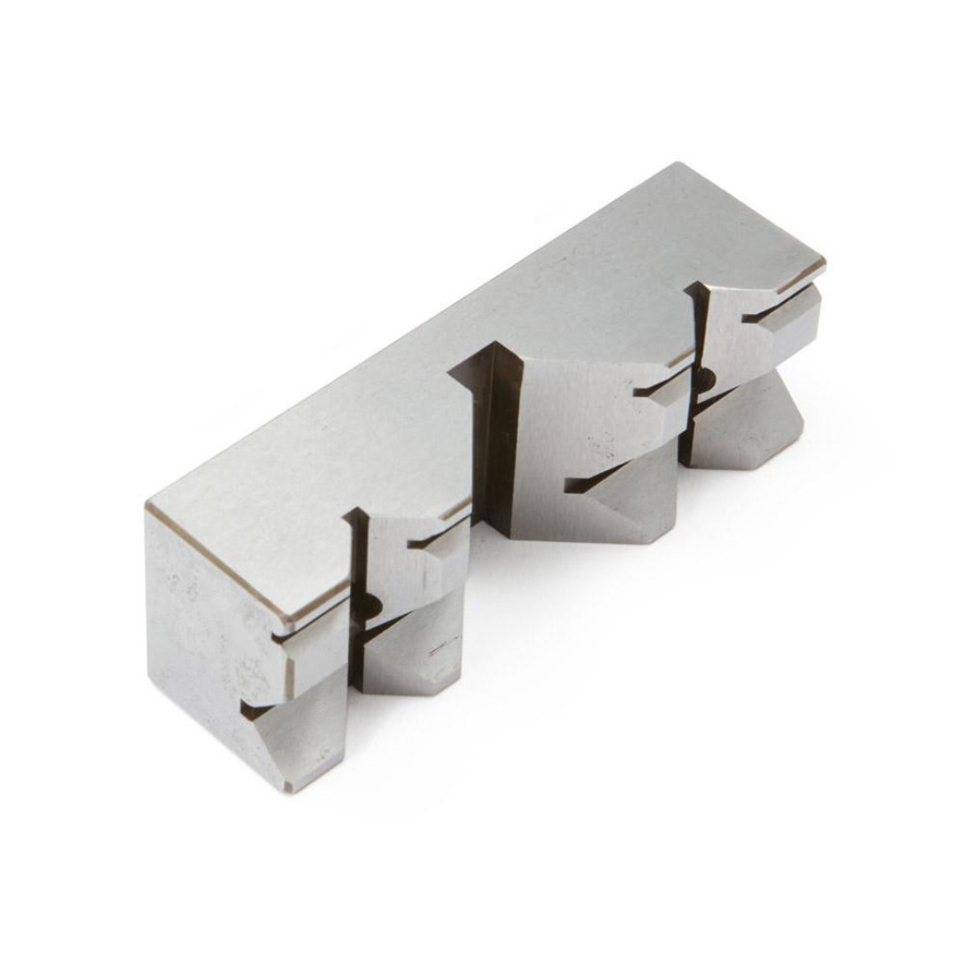Kurt Vise Jaw: 3.97" Wide, 1.3740" High, 1.1250" Thick, V-Groove 09219601 angled view showing the hardened steel jaw construction, V-groove design, and bolt-on mounting configuration for compatible machine vises.