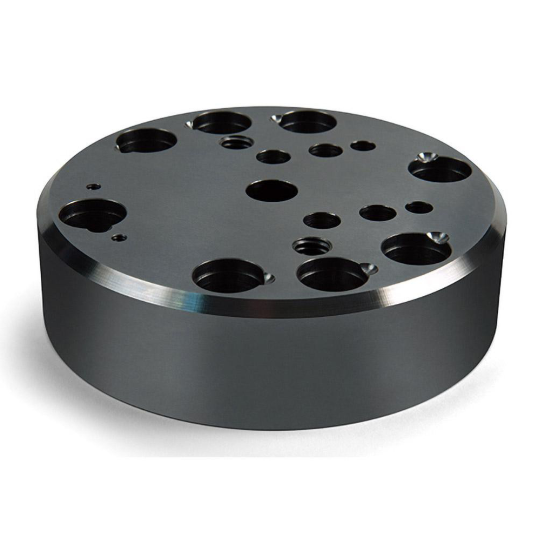 Kurt Vise Jaw Accessory: Riser DT20-1 angled view showing durable machined construction, precision hole pattern, and rigid riser design for accurate fixture positioning and workholding applications.