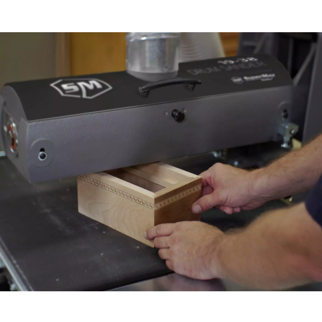Laguna SuperMax 19-38 Drum Sander SUPMX-71938-D sanding wood board through conveyor system