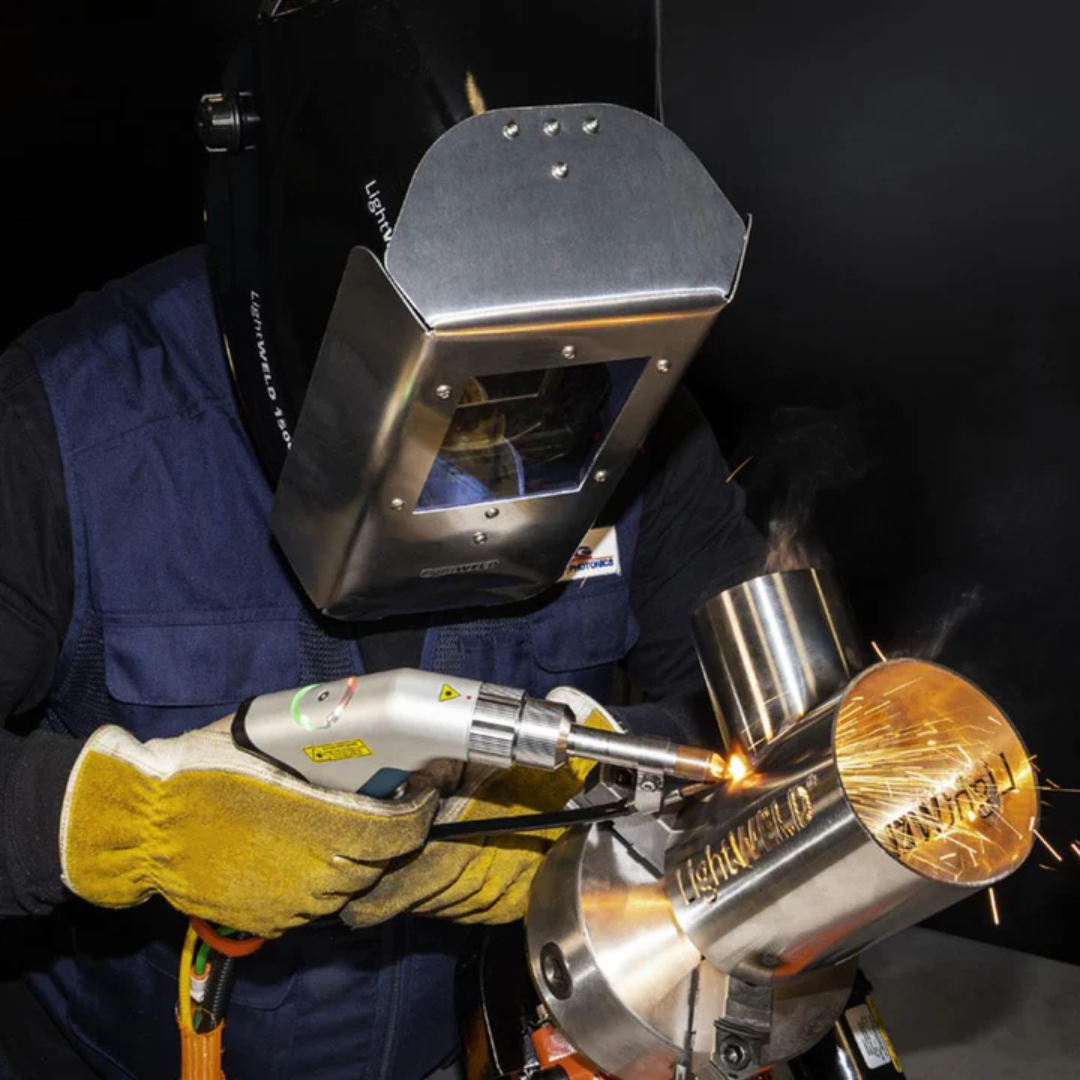 LightWELD 1500 XC handheld laser welding and cleaning system SYSHHWXC0000002U in operation performing precision metal welding with protective equipment
