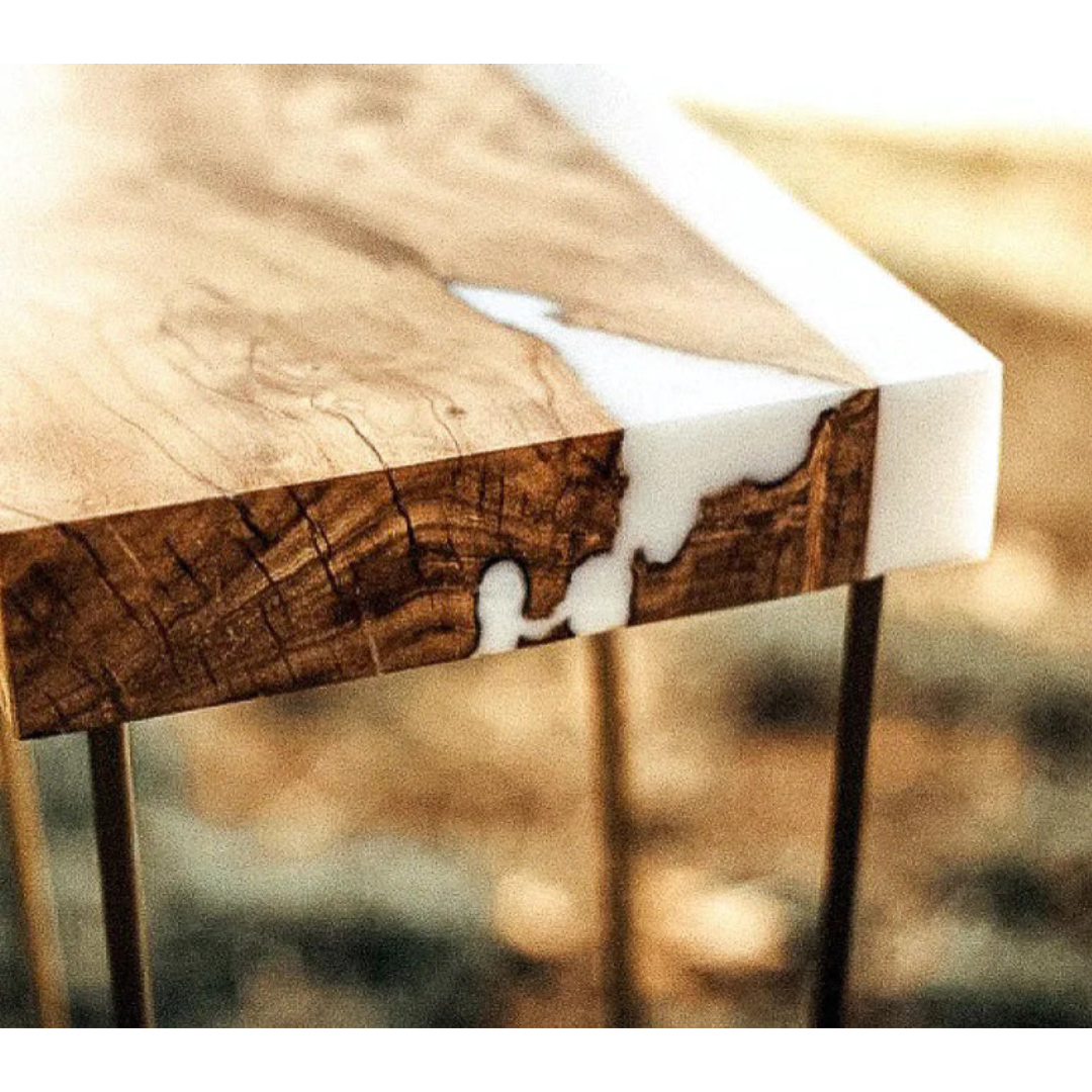 Live edge wood river table with white epoxy inlay created using Ecopoxy SnowWhite EPSWK20‐15L.