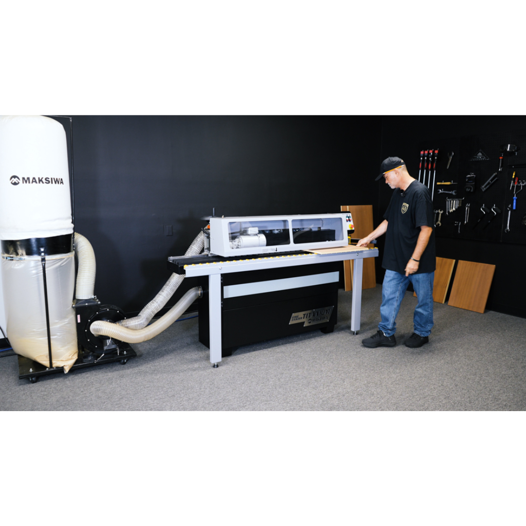 Maksiwa CP/2.C Dust Collector in a workshop connected to a woodworking machine for dust collection