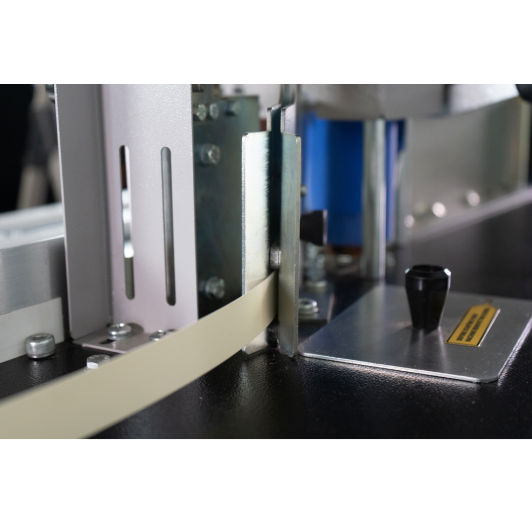 Maksiwa CBC.E Portable Edgebander operating along board edge, close-up side angle