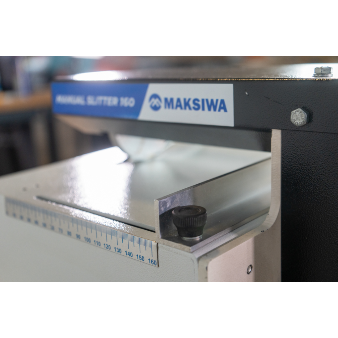 Maksiwa F.160 manual slitter with flat cutting table, precision guide system, and stable manual slitting operation