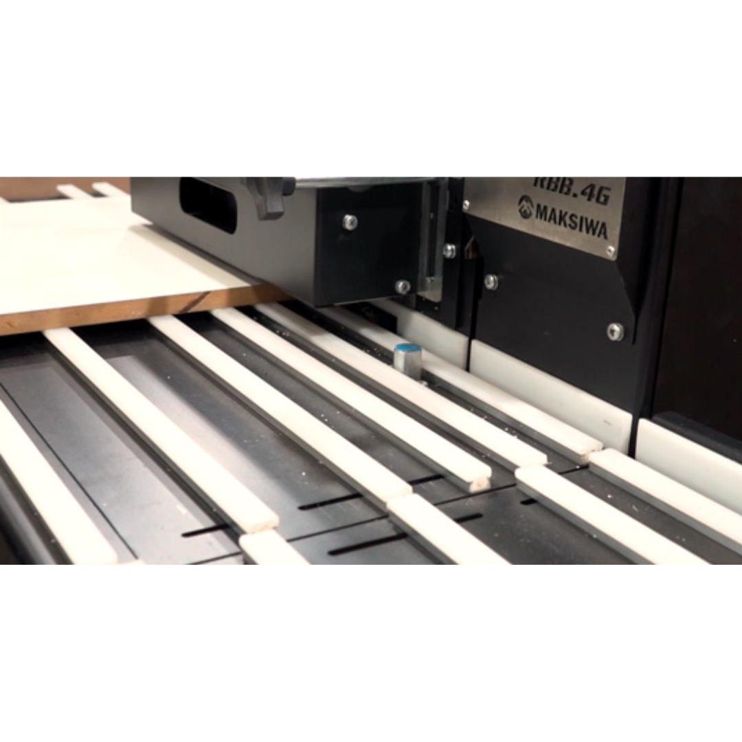 Maksiwa RBB.4G Edge Trimmer Machine close-up of in feed rollers and support rails for stable panel guidance