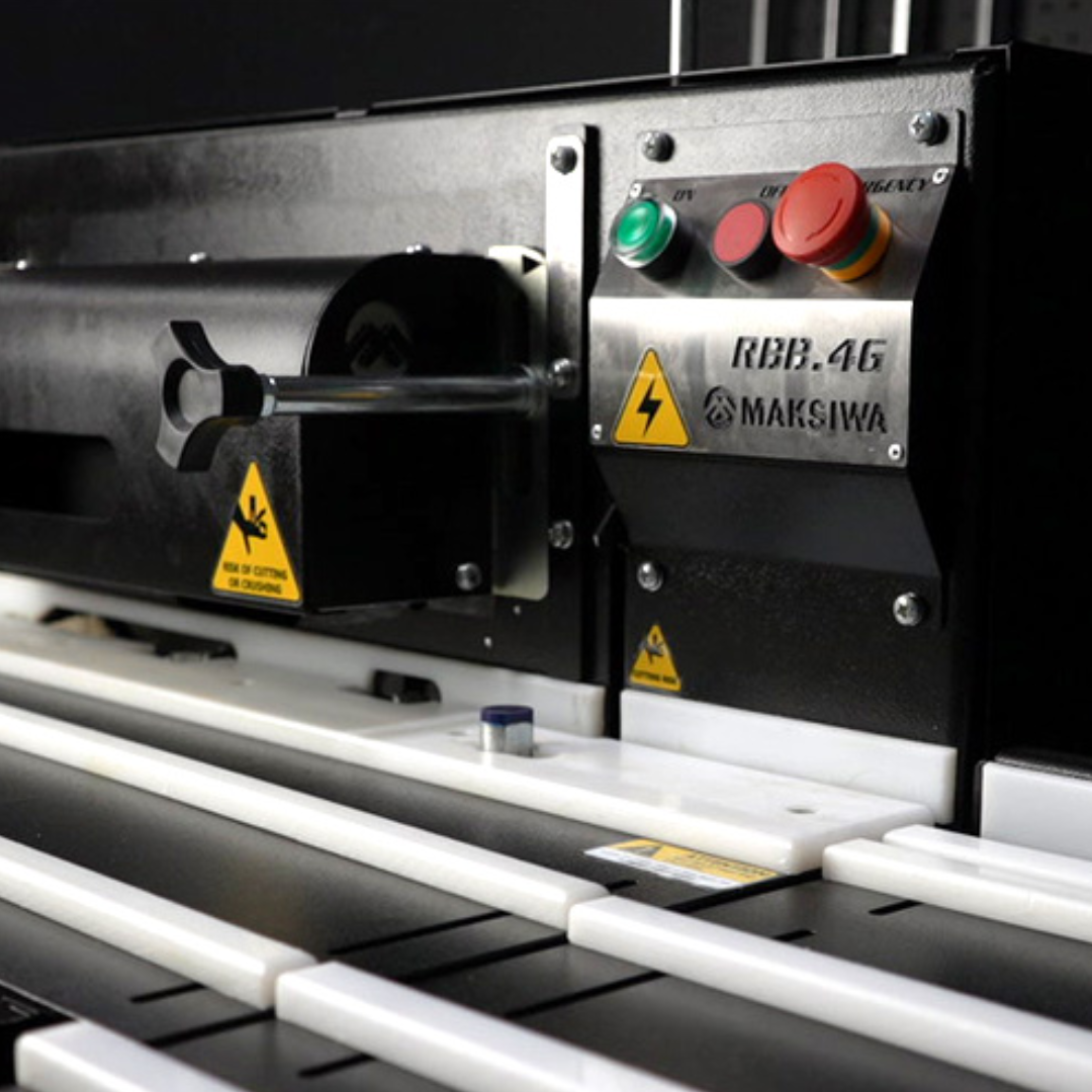 Maksiwa RBB.4G Edge Trimmer Machine working areabels_aa showing feed rollers_safety lnd finishing head assembly