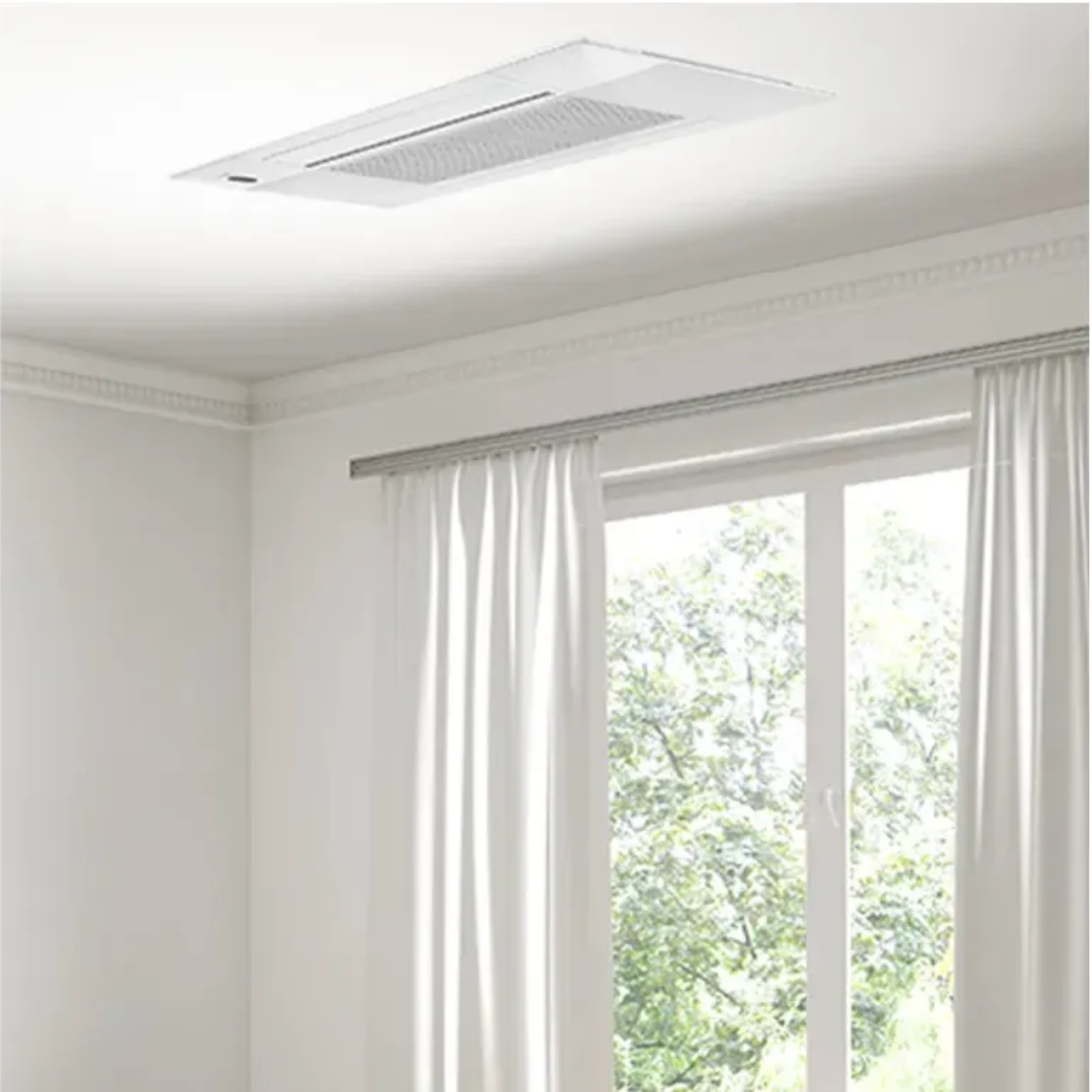 Mrcool DIY 5th Gen OuttaSight DIYCASSETTE06HP-230D25-O ceiling cassette mini split unit installed in residential room with window and curtains, low-profile hidden design