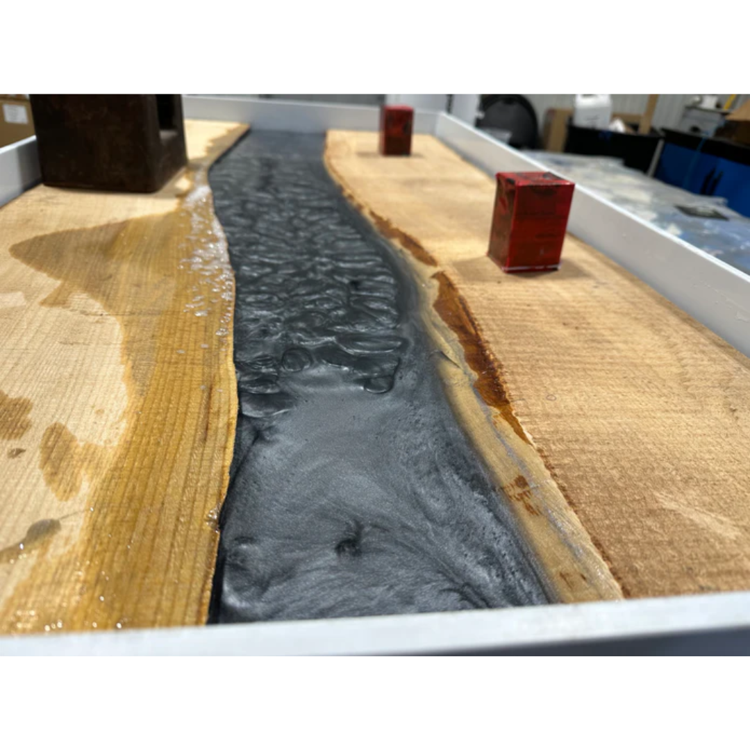 Multiple epoxy and wood sample castings made with Ecopoxy FlowCast SPR Premium Casting Epoxy.