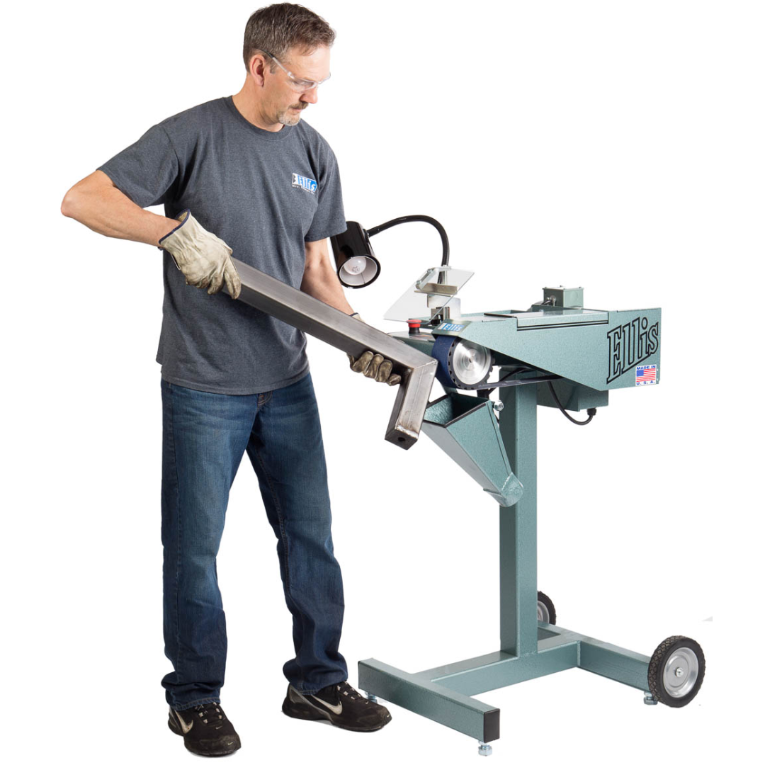 OperatorgrindingsquaresteeltubingonEllisindustrialbeltgrinder