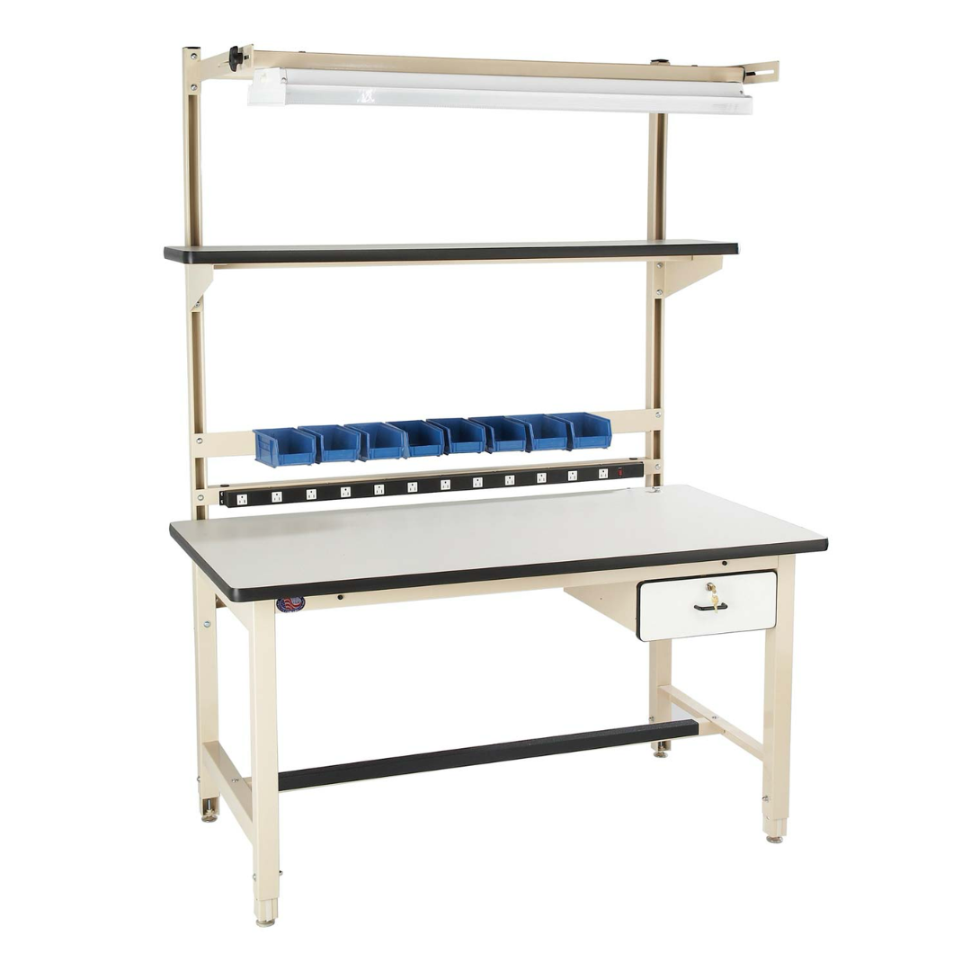 Proline Workbench BIB1 industrial workbench with integrated overhead fluorescent lighting, durable laminate work surface, parts storage bins, built-in power strip, locking drawer, and heavy-duty steel frame for assembly and production environments.