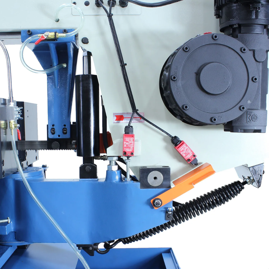 Rear angled view of the Baileigh 13-Inch Dual-Mitering Semi-Automatic Bandsaw (BS-20SA-DM) 1001298 highlighting the hydraulic saw head, drive motor, and structural steel construction designed for continuous production cutting.