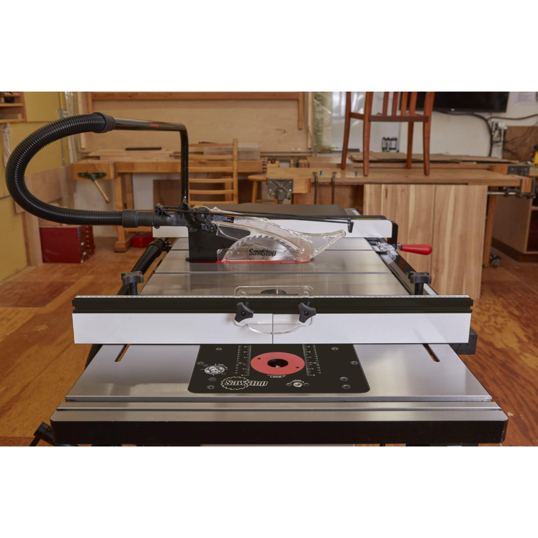 SawStop 27″ In-Line Router Table RT-TGP close-up view highlighting the router table surface, fence system, and professional-grade construction for accurate routing applications..