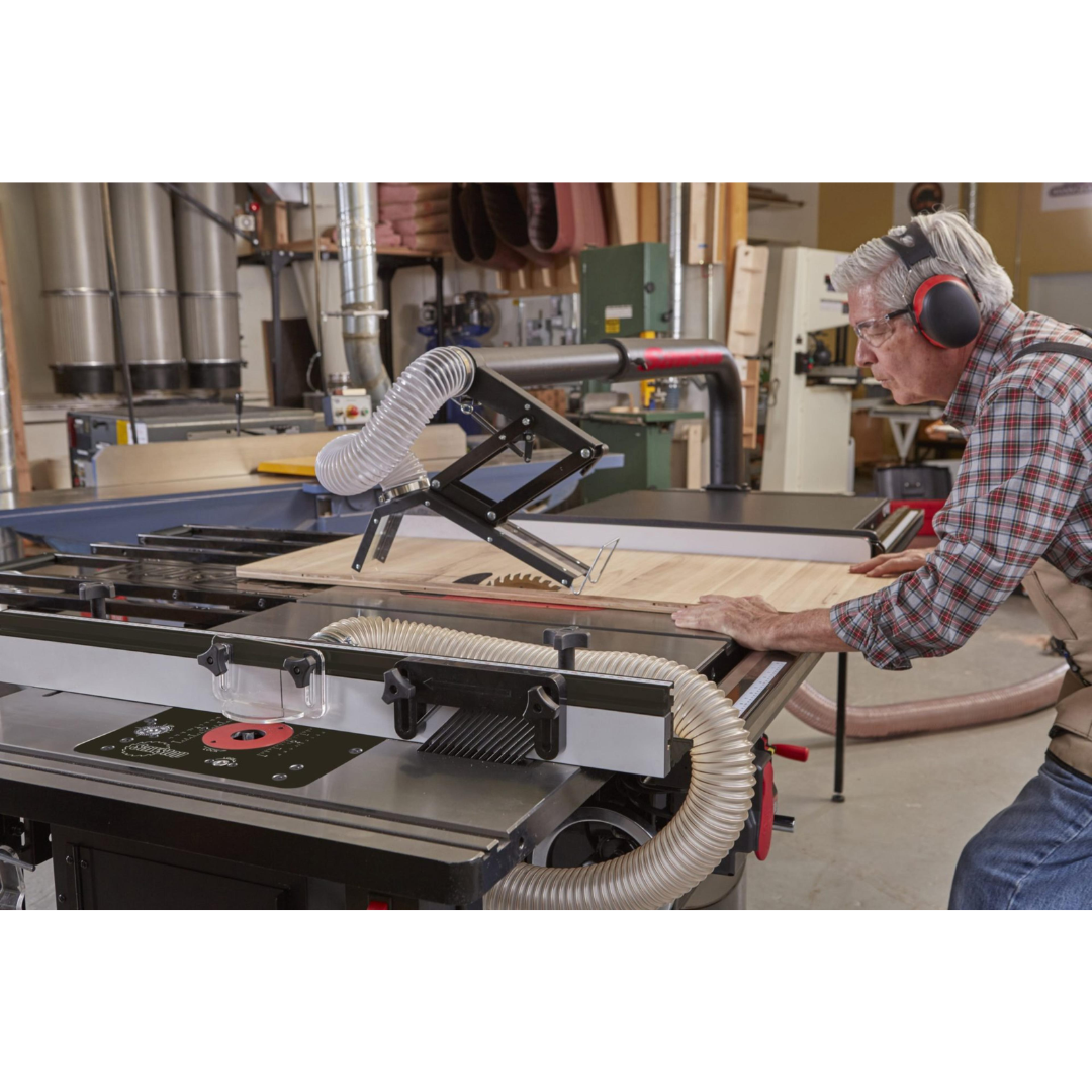 SawStop 30″ In-Line Router Table RT-TGI demonstrating material handling during routing operations, delivering stability and precision for detailed woodworking tasks.