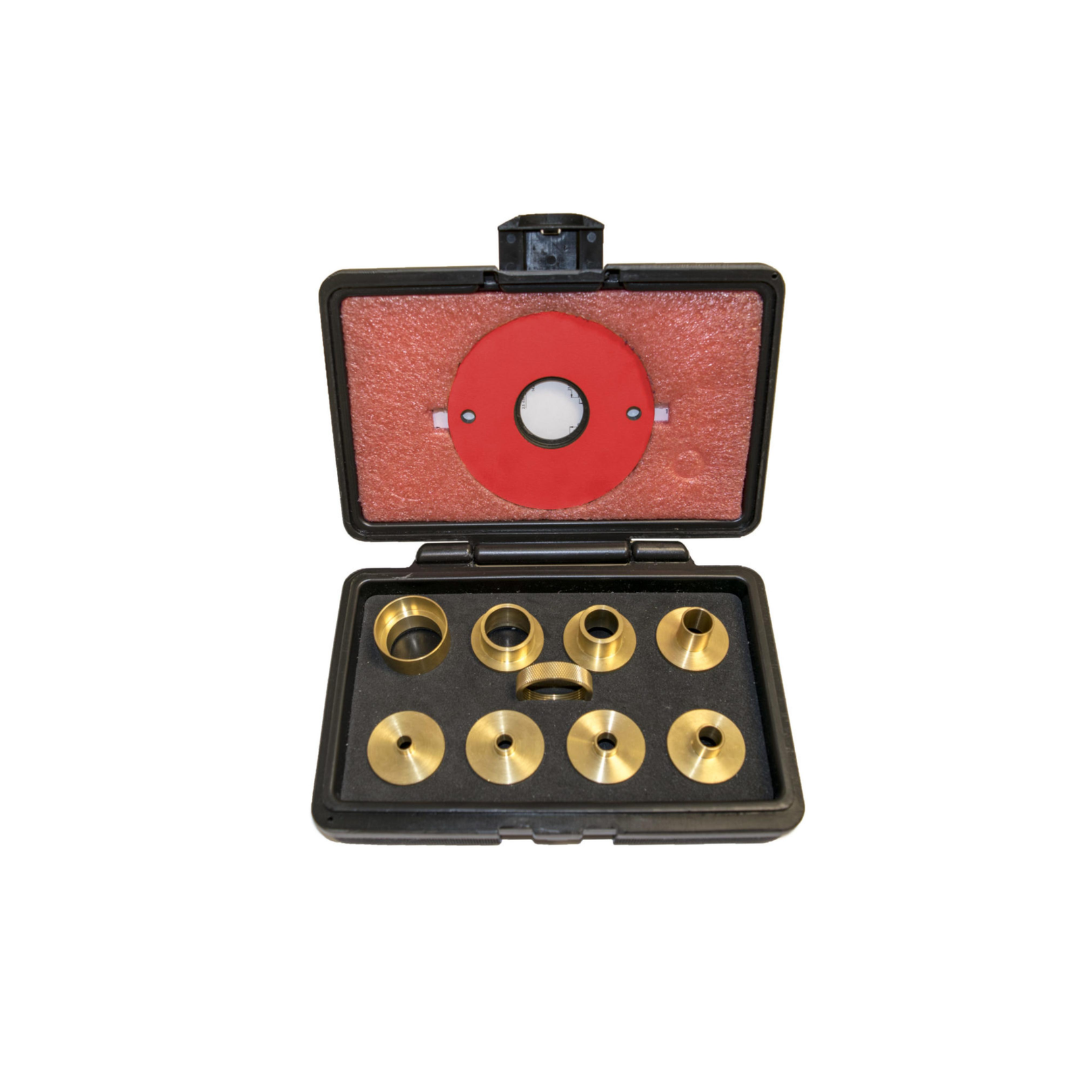 SawStop 9-Piece Brass Precision Template Guide Set RT-TGS featuring precision-machined brass guide bushings, locking ring, and router table insert components organized in a protective storage case for accurate template routing applications.