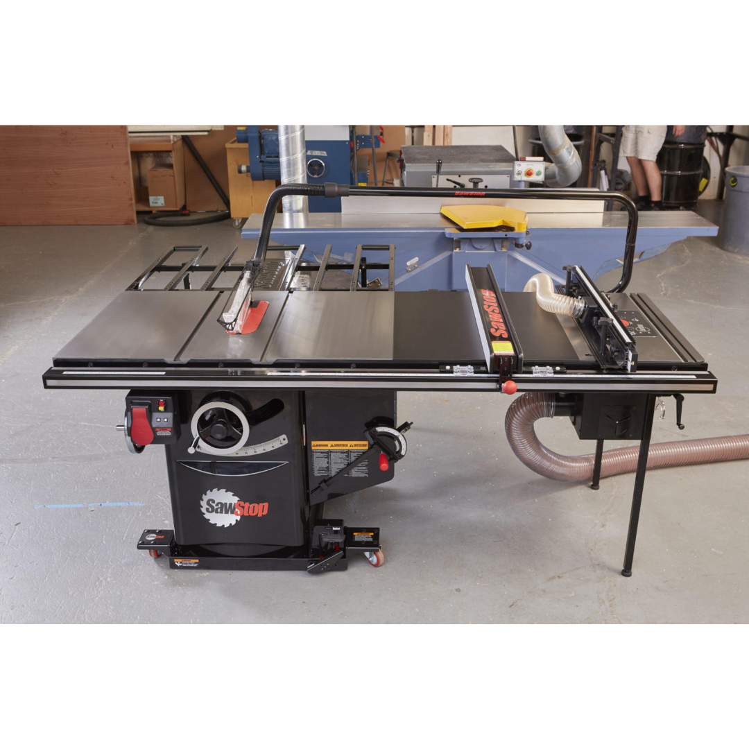 SawStop Industrial Saw Mobile Base MB-IND-000 supporting an Industrial Cabinet Saw in a professional workshop, demonstrating easy machine positioning and enhanced shop flexibility.