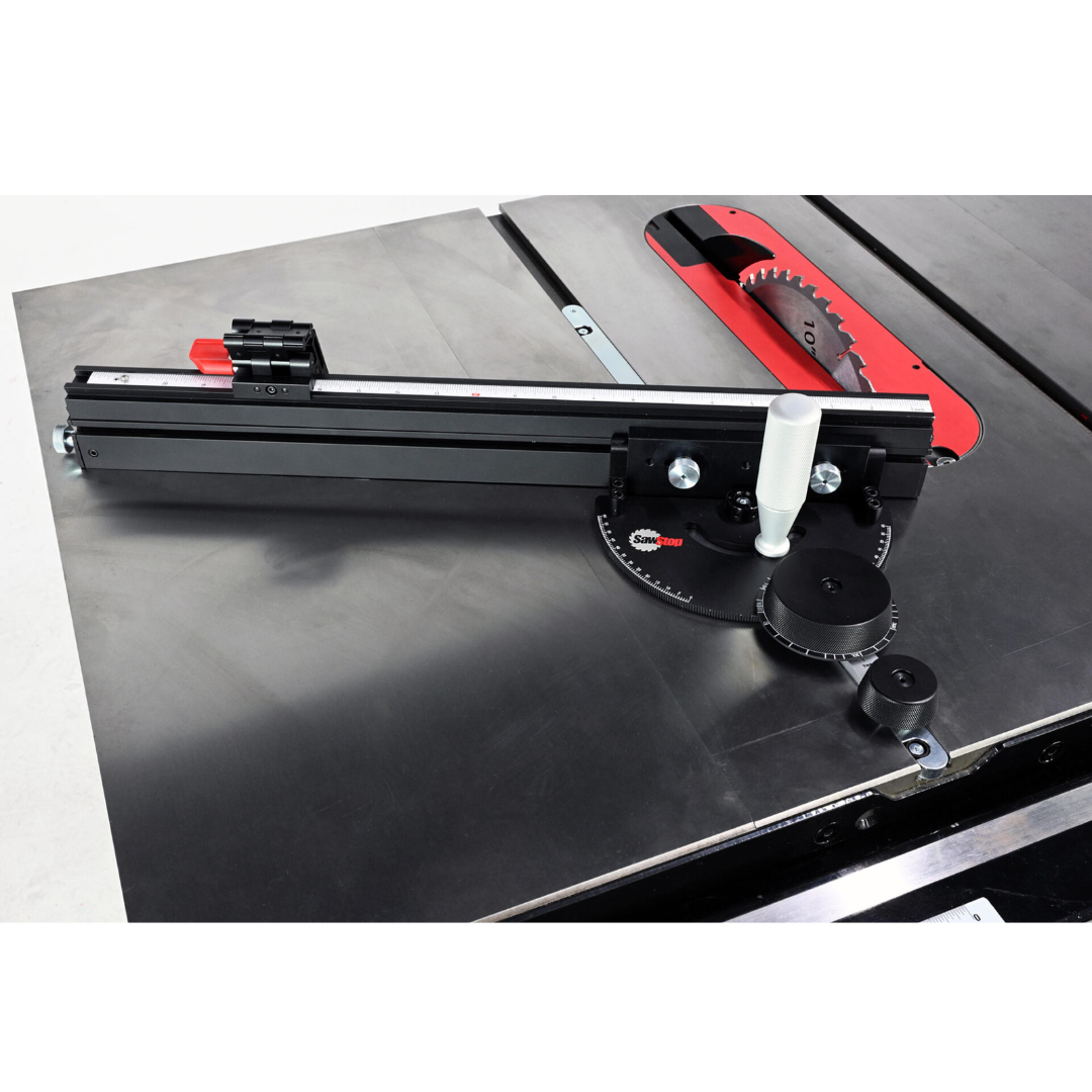SawStop Revolution Miter Gauge TSA-RMG installed on a table saw with adjustable fence and flip stop system designed for accurate, repeatable crosscuts and angle cuts.