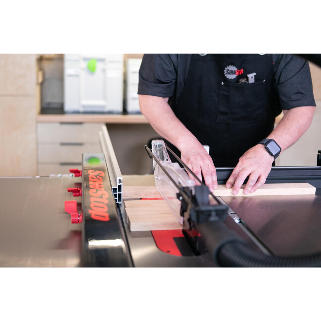 SawStop T-Glide Advance Fence supporting a workpiece during cutting operations, providing dependable accuracy and smooth material guidance.
