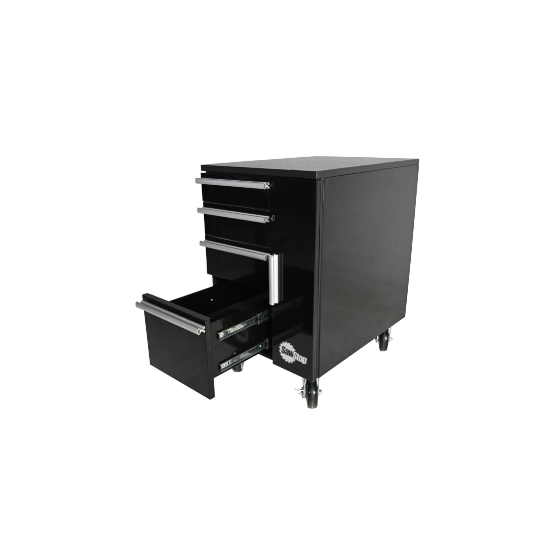 SawStop Under Table Cabinet 18″ TSA-UTC18 featuring extended drawers designed for convenient storage of blades, measuring tools, insert plates, and shop accessories.