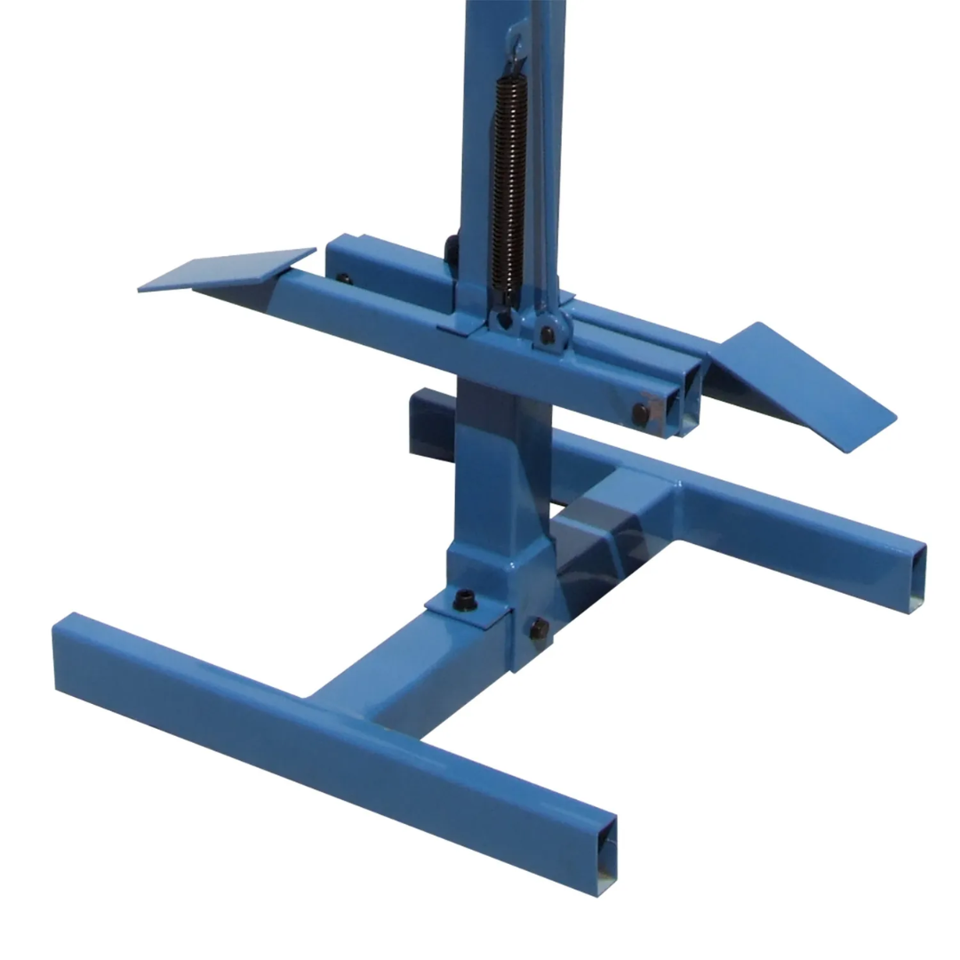 Side view of the Baileigh Shrinker Stretcher - (MSS-18) 1005727 displaying the sturdy floor stand, foot pedal linkage, and ergonomic design for hands-free sheet metal forming.