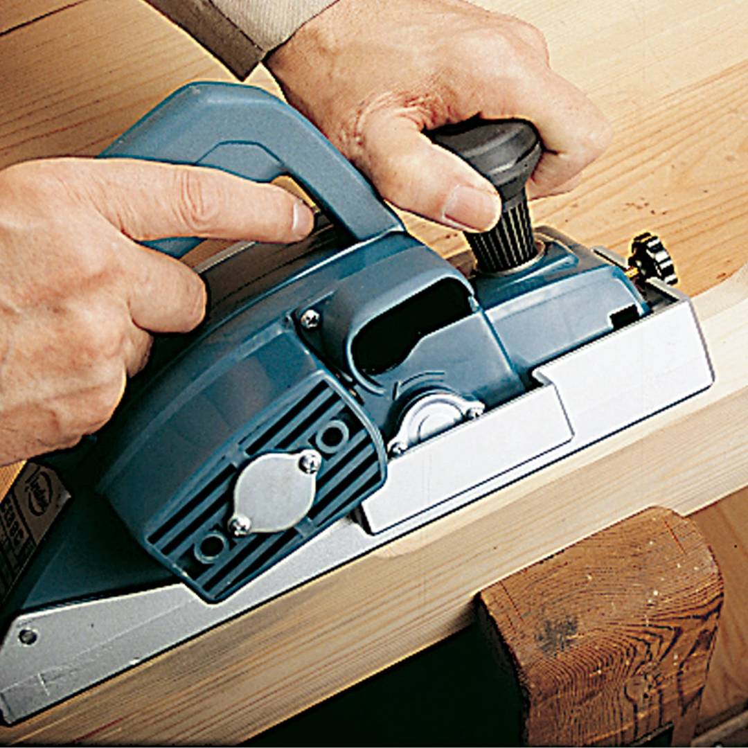 Virutex CE89E Chamfering Planer For Edge Finishing (120V) 8900199 in use creating a smooth chamfer along a wooden edge