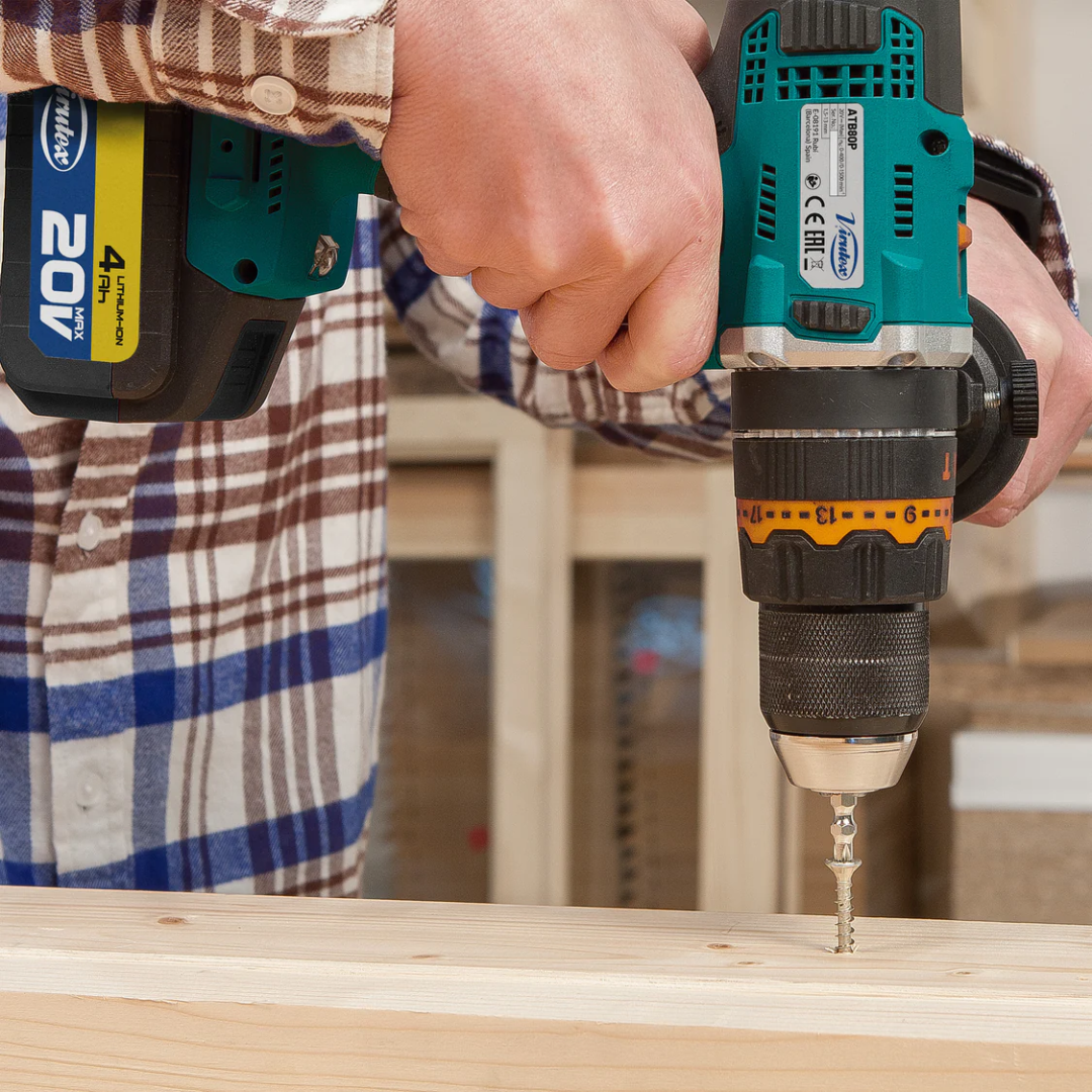 Virutex Cordless Impact Drill/Screwdriver ATB80P in use drilling into wood with strong torque and control