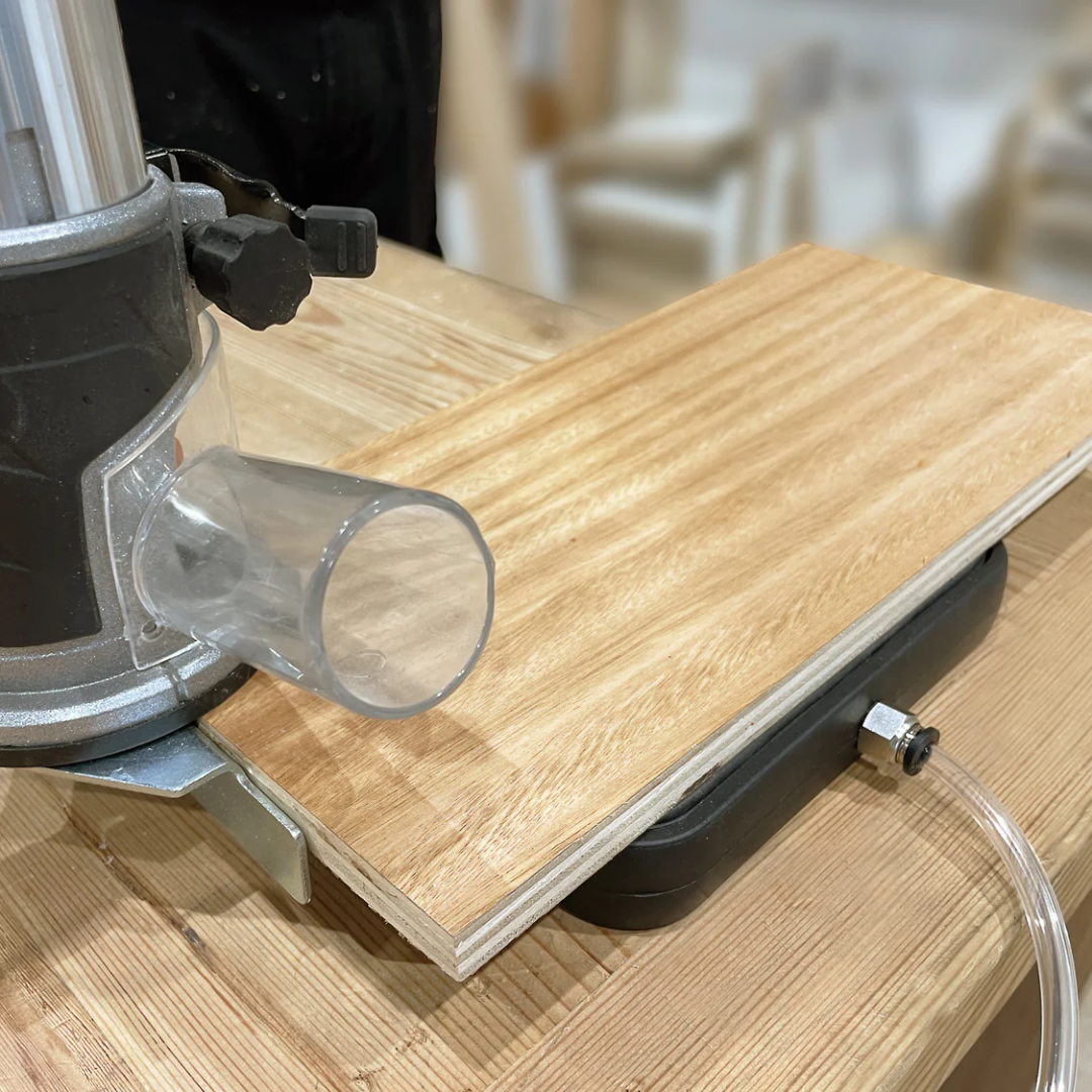 Virutex DUO-Sided Vacuum Pad 5046773 in-use with router showing stable hold on wooden workpiece during machining