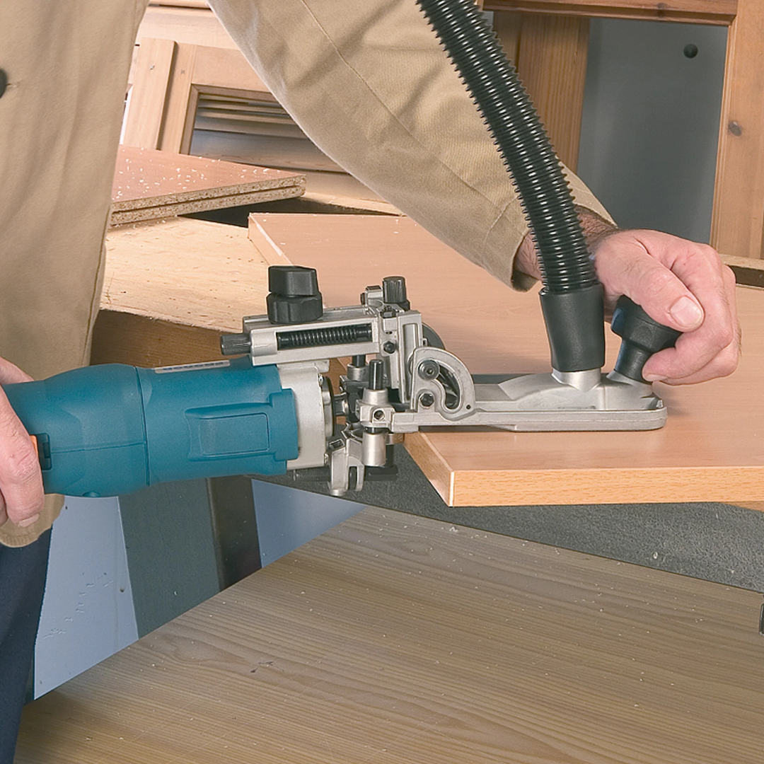 Virutex FR292R Electronic Tiltable Trimmer (120V) 9200499 demonstrating tilt adjustment angles for versatile edge trimming