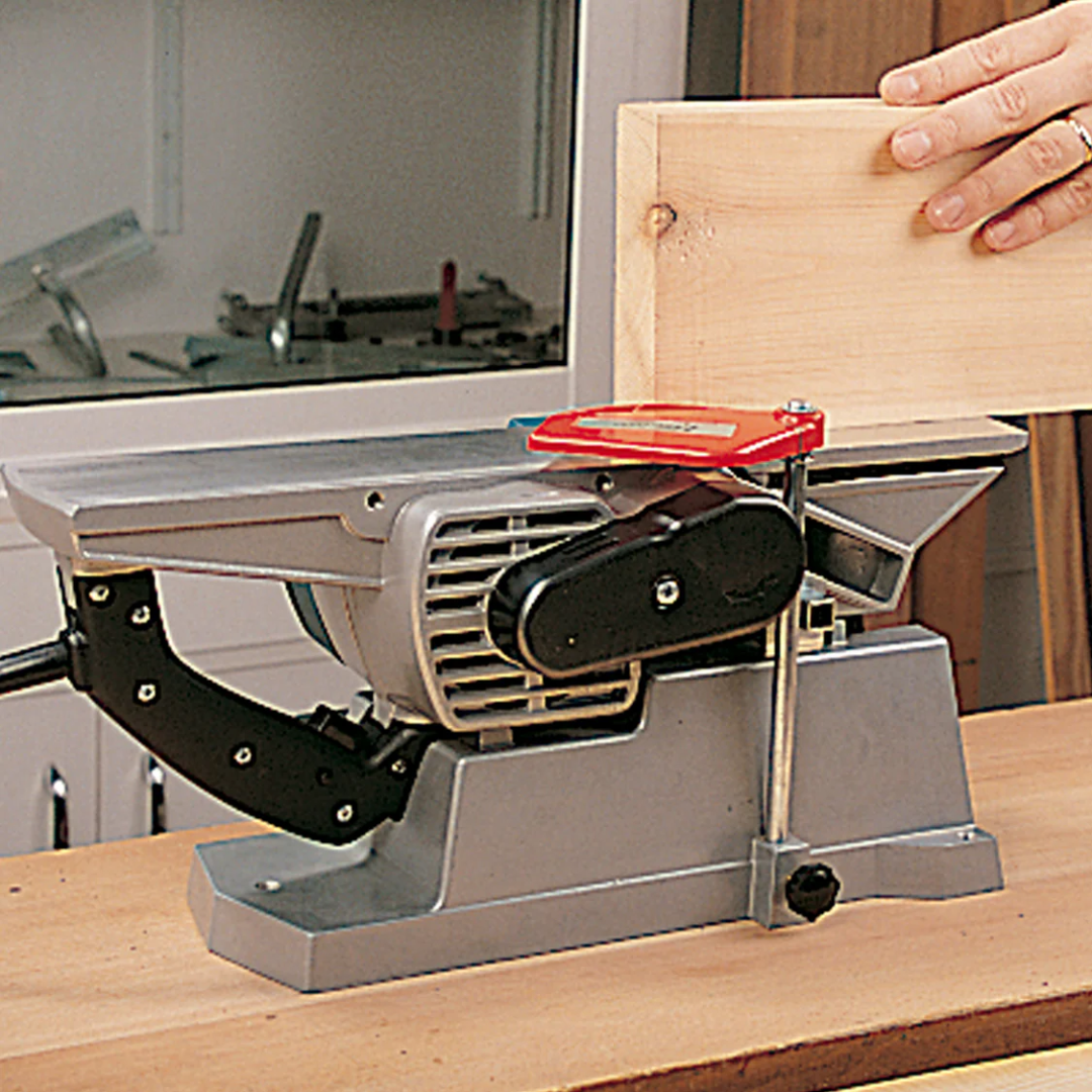 Virutex Hand Planer CE24E For Fine Finishing (120V) 2400199 displayed in workshop setting showing stable base plate and fence system for consistent and precise planing results.