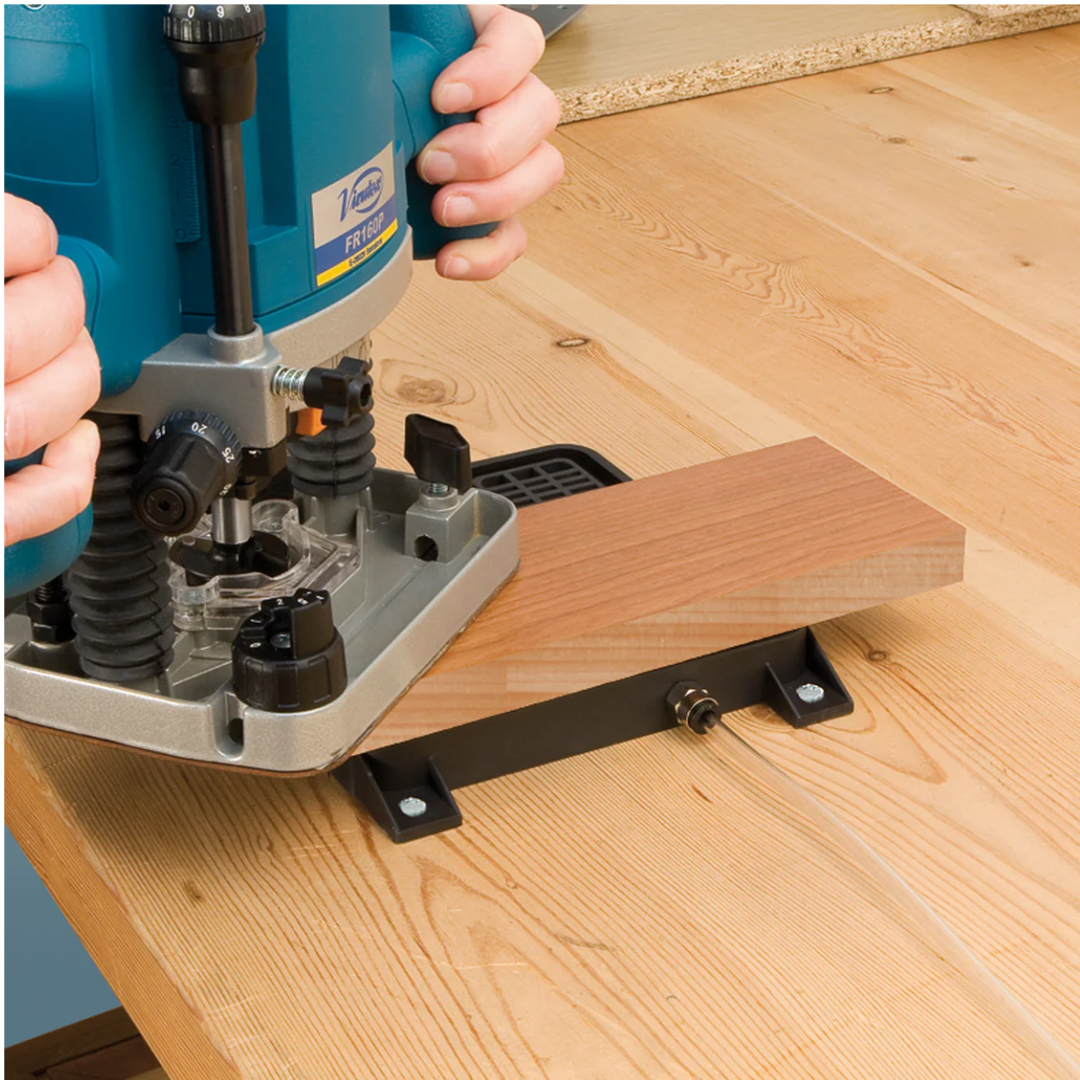 Virutex SVN250 Vacuum Pad For Secure Fastening 5046371 in use with a router for precision woodworking operations on flat surfaces