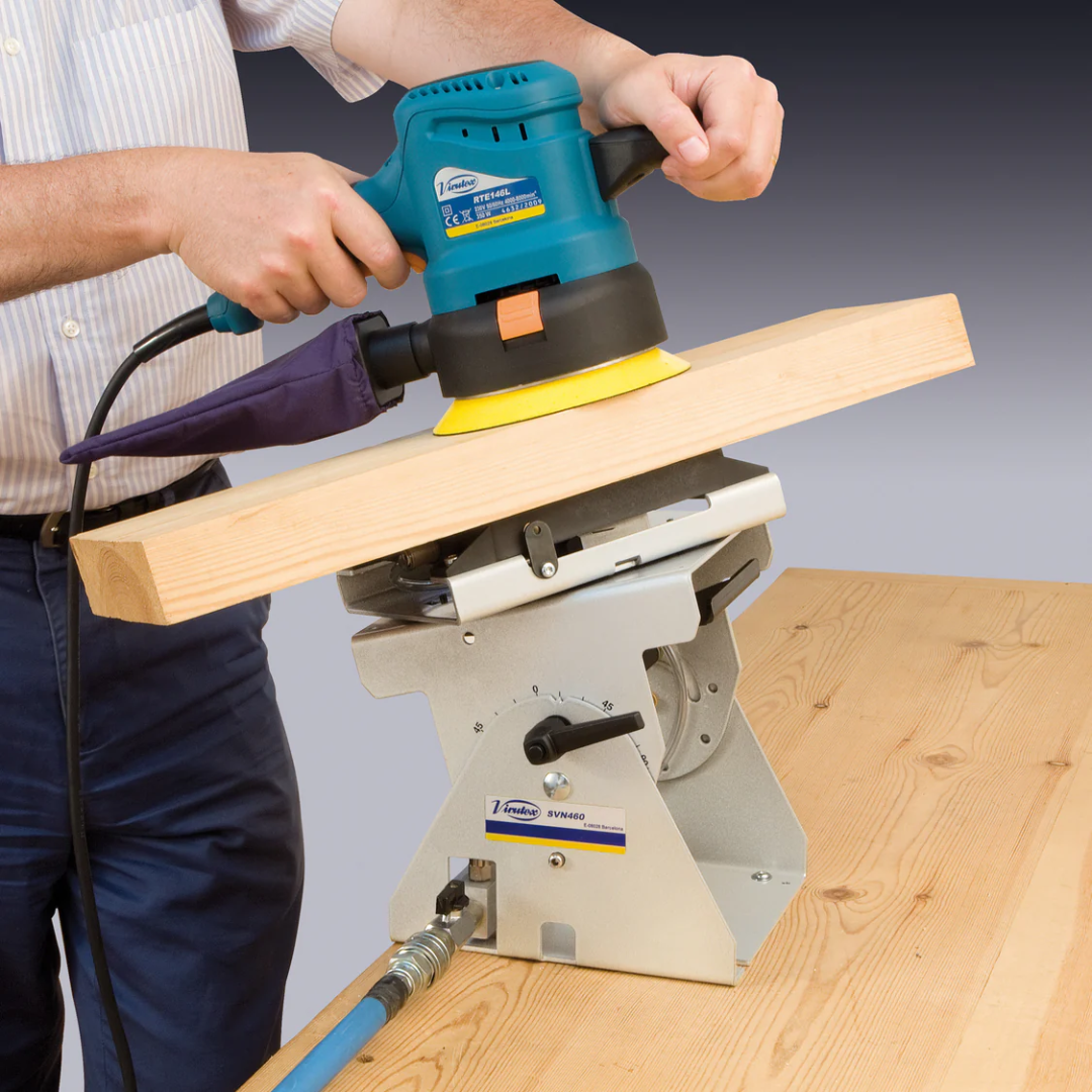 Virutex SVN460 Multiple Fastening System Tilting + Swivelling 5046400 in use with a handheld router for accurate edge processing
