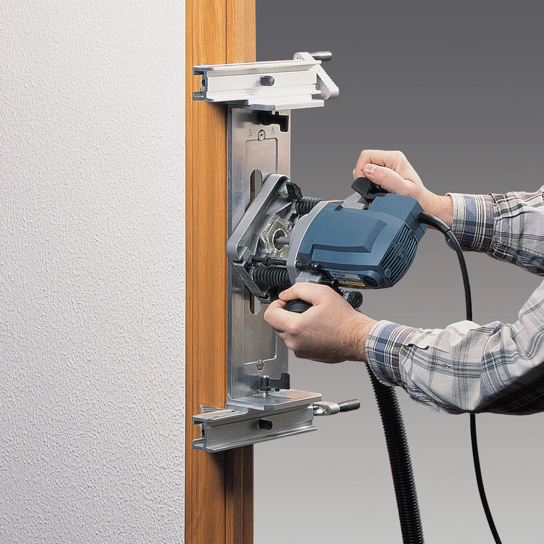 Virutex UC16K Lock Mortising Template Holder Accurate Mortises 1645347 mounted on door for precise mortising setup