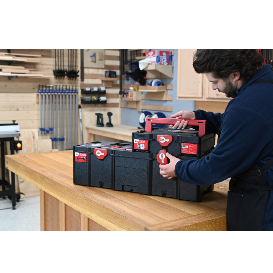 Woodworker using the SawStop Premium Dado Set Systainer BTS-DS8-SYS in a workshop setting, demonstrating convenient transport, storage, and jobsite readiness for precision woodworking tasks.