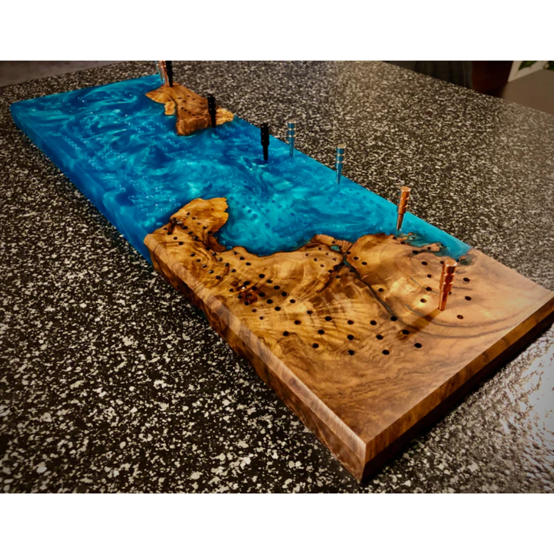 Woodworking project pouring tinted resin using Ecopoxy FlowCast SPR Premium Casting Epoxy.