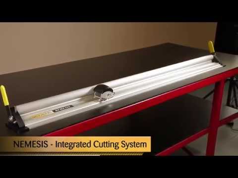 Safetyspeed Nemesis Integrated Cutting System mounted on a workbench demonstrating large format cutting capability and stable support system.