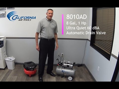 California Air Tools 8010AD Ultra Quiet, Oil-Free, Lightweight 1.0 Hp 8-Gallon Air Compressor with Automatic Drain Valve in workshop environment demonstrating portability
