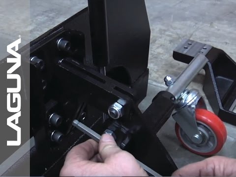 Laguna REVO 18|36 & 24|36: WHEEL SYSTEM ALAREVO18 WHEEL SYSTEM close-up of foot-operated lift mechanism and mounting hardware for lathe mobility system