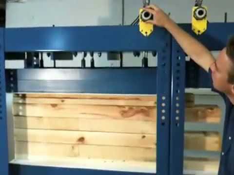 JLT #78H Mini Pod Press in operation applying even pressure across wood panels during glue-up process