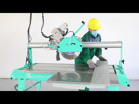 Operational view of the IMER COMBICUT 350 iPOWER overhead rail saw demonstrating precision cutting performance and advanced rail-guided wet saw operation