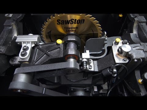 Close-up view inside the SawStop Industrial Cabinet Saw showcasing heavy-duty internal trunnion assembly, precision engineering, and industrial performance components.