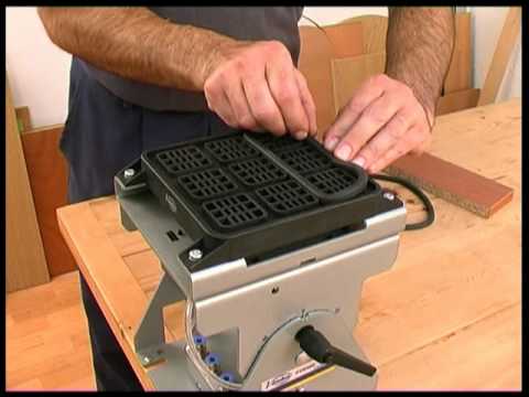 Virutex SVN460 Multiple Fastening System Tilting + Swivelling 5046400 demonstrating secure clamping and positioning on a workbench